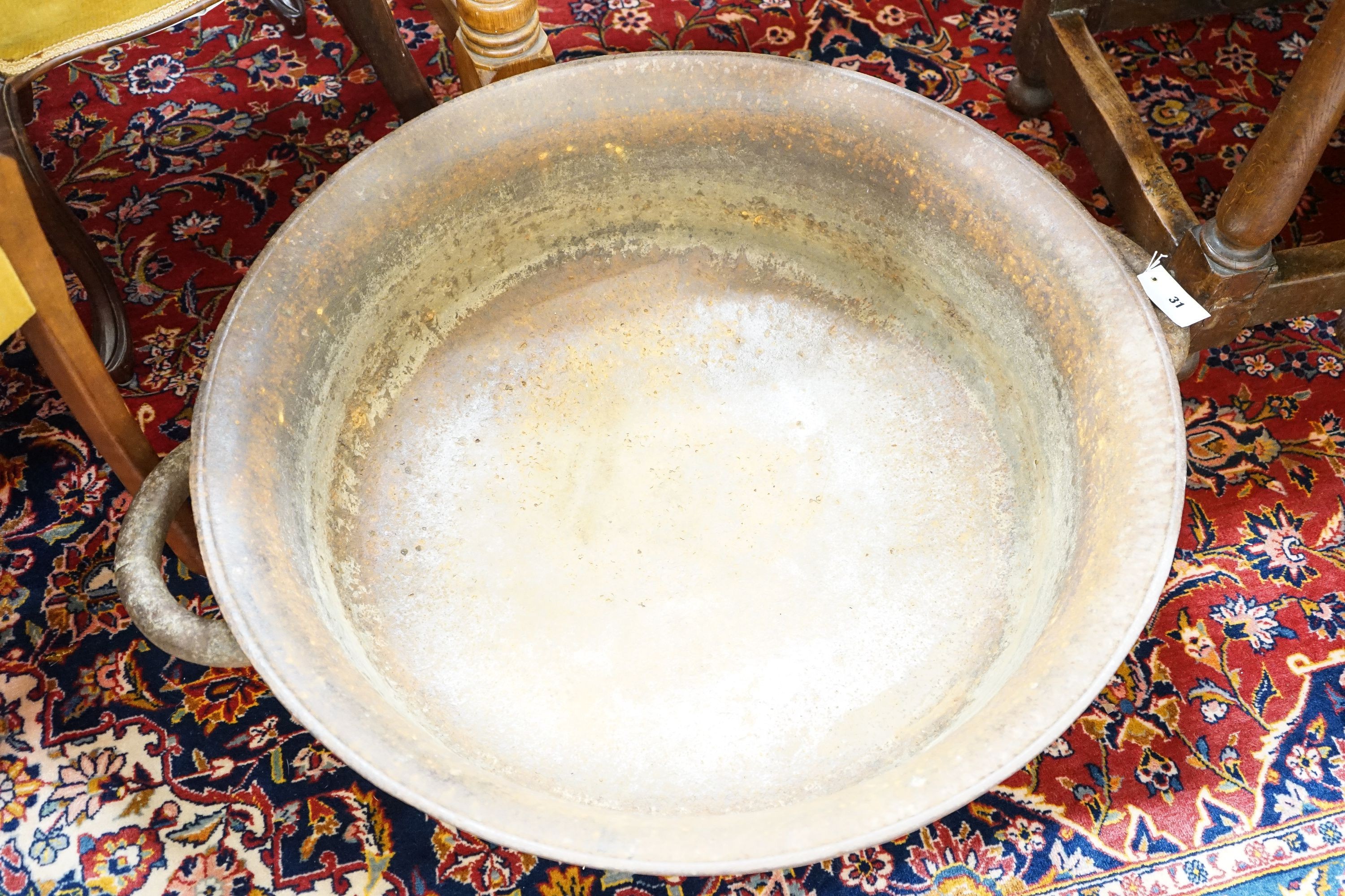 A large cast iron French circular preserve pan, diameter 82cm, height 26cm